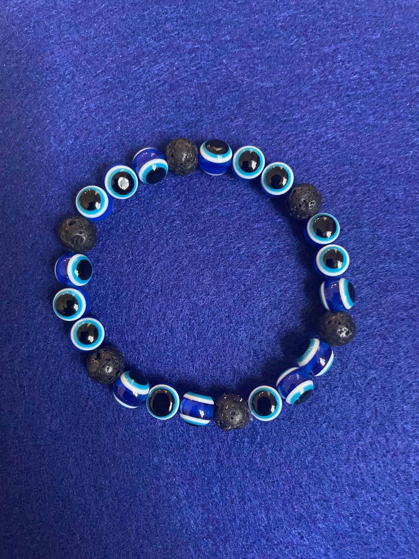 EVIL EYE AND LAVA STONE BRACELET 7.5"